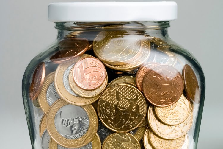 o que é uma moeda flor de cunho